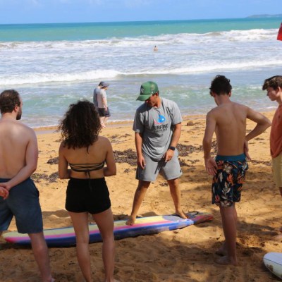 a group of people on a beach