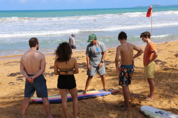 a group of people on a beach